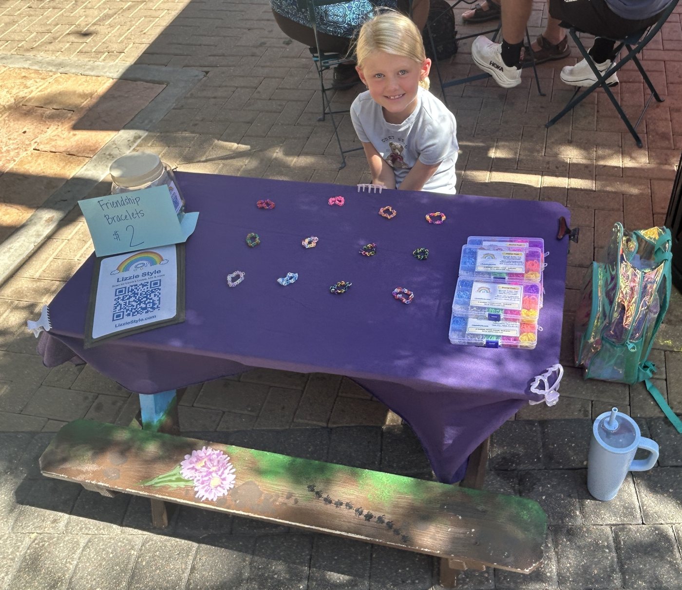 Lizzie at her stand with the first Starter Packs for sale
