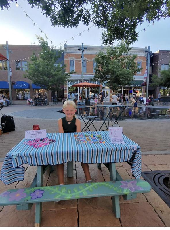 Lizzie at her Lizzie's Loops stand